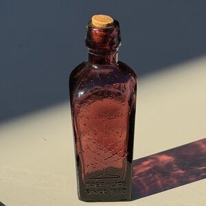 Vintage Wheaton Straubhullers Tree of Life Elixir Bottle with Cork, Purple 3.25”